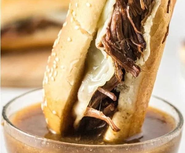 Delicious Easy Crock Pot French Dip sandwich with beef and dipping broth